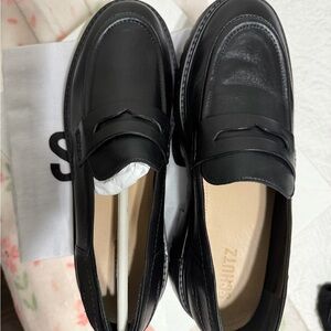 SCHUTZ Black Leather Penny Loafers for Men